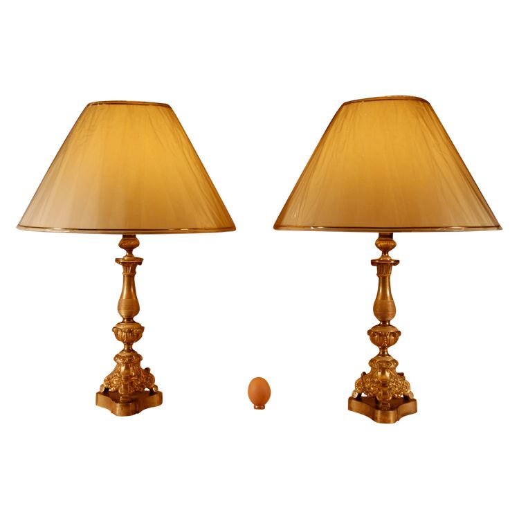 Pair of original table lamps in cast brass.