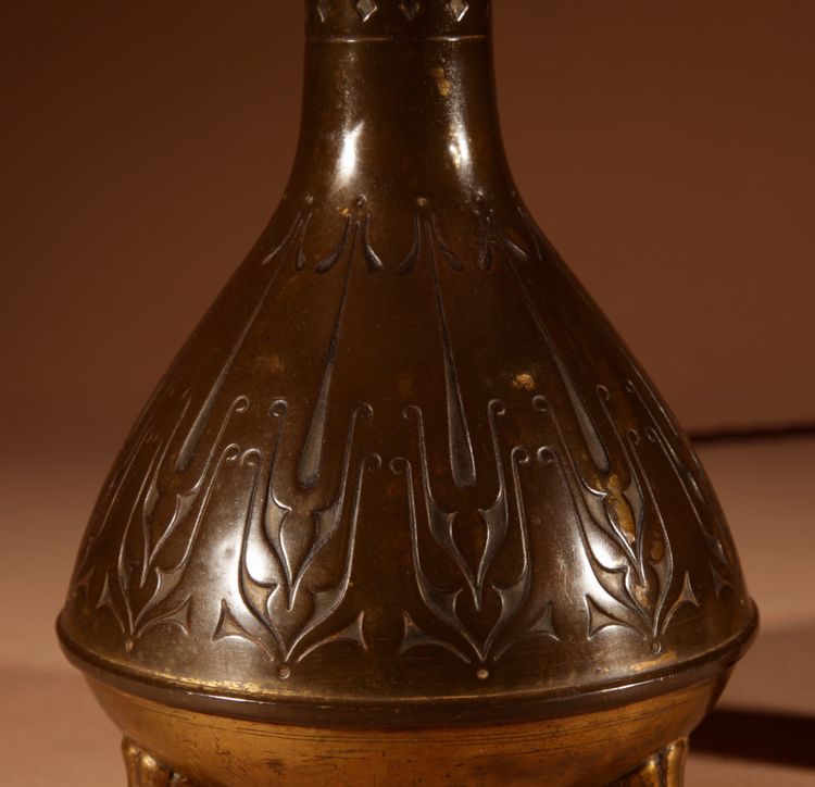 Elegant, original brass table lamp by the Amsterdam school.