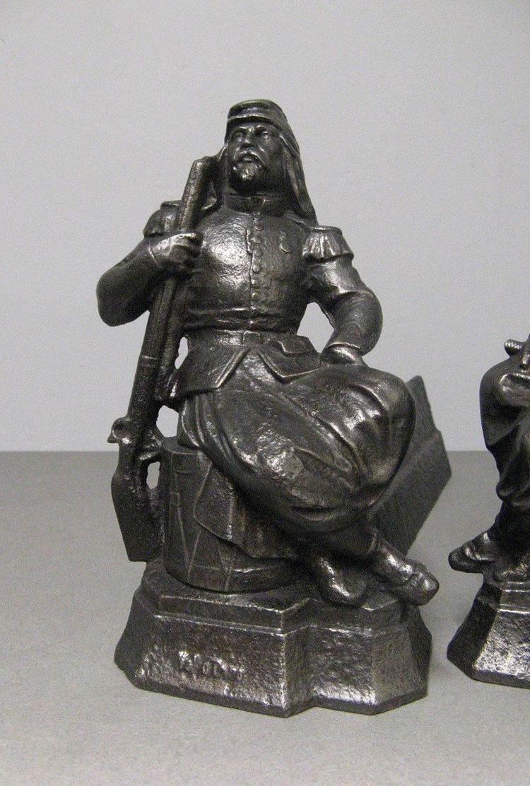 Pair De Chenets Aux Zouaves.