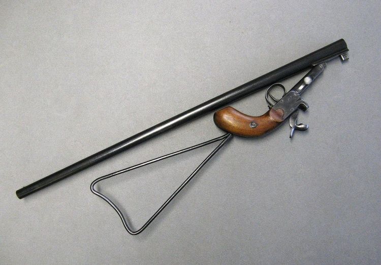 Pistola / Carabina da bracconiere a broche con crosse squelette di St Etienne XIXe.