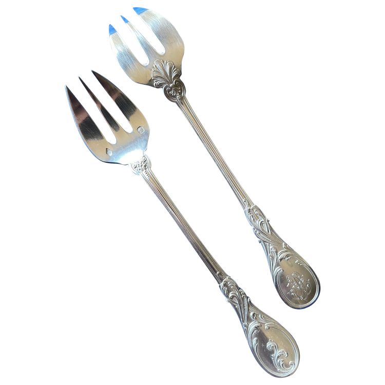12 oyster forks.