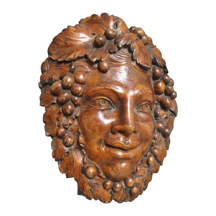 Bacchus head in glazed terracotta.