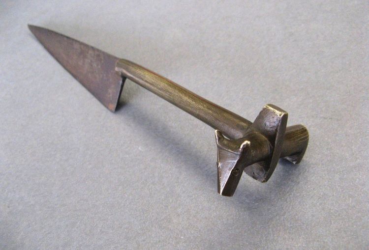 An ancient knife used to sacrifice Zebu during circumcision ceremonies.