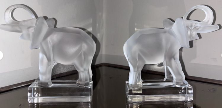 LALIQUE France Pair of Éléphants bookends in moulded and satin-finish crystal.