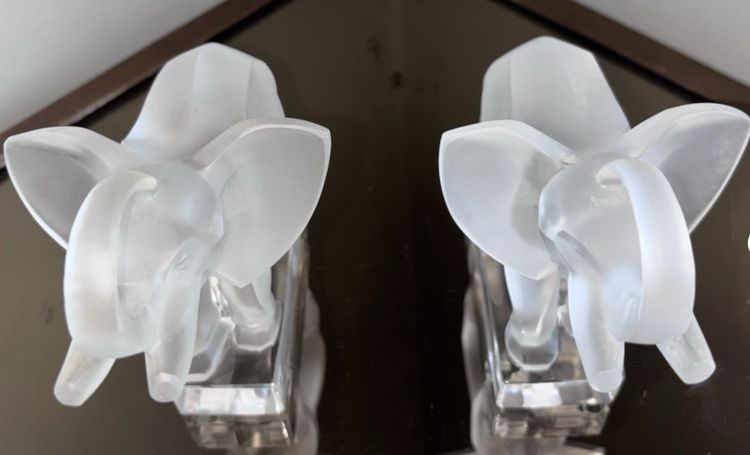 LALIQUE France Pair of Éléphants bookends in moulded and satin-finish crystal.