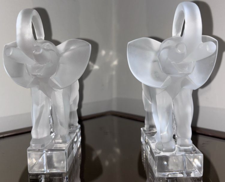 LALIQUE France Pair of Éléphants bookends in moulded and satin-finish crystal.