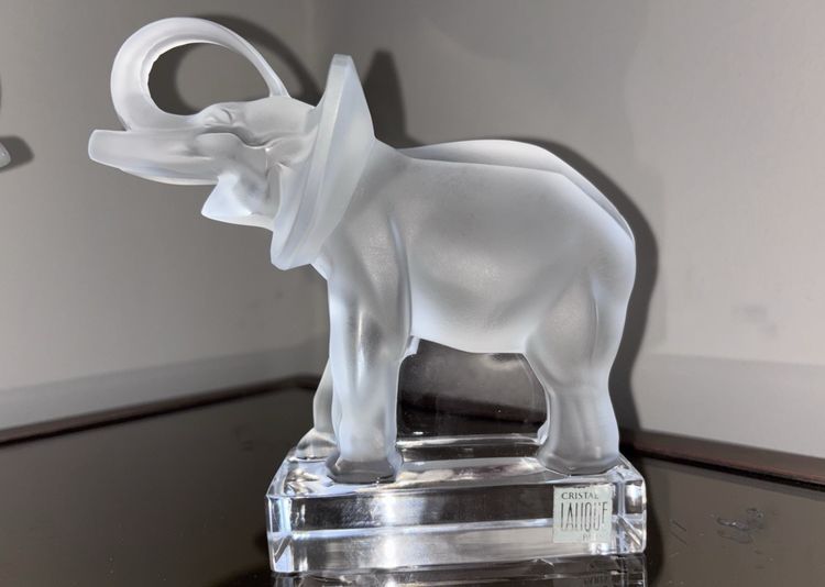 LALIQUE France Pair of Éléphants bookends in moulded and satin-finish crystal.