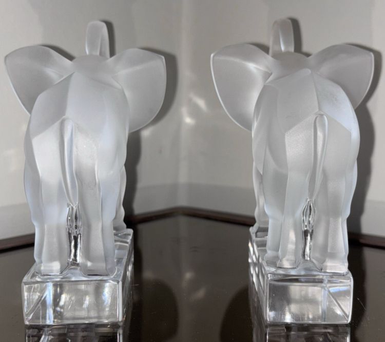 LALIQUE France Pair of Éléphants bookends in moulded and satin-finish crystal.
