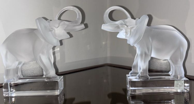 LALIQUE France Pair of Éléphants bookends in moulded and satin-finish crystal.