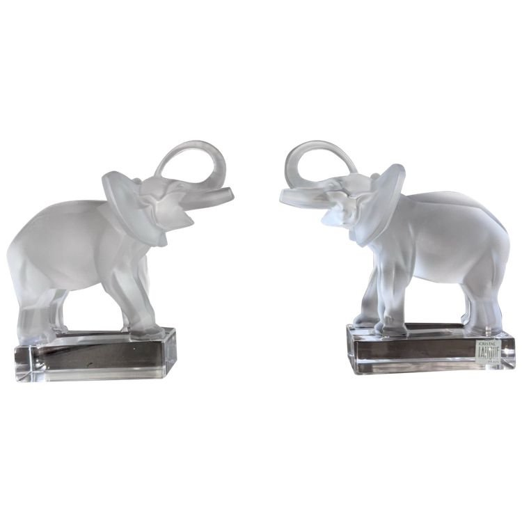LALIQUE France Pair of Éléphants bookends in moulded and satin-finish crystal.