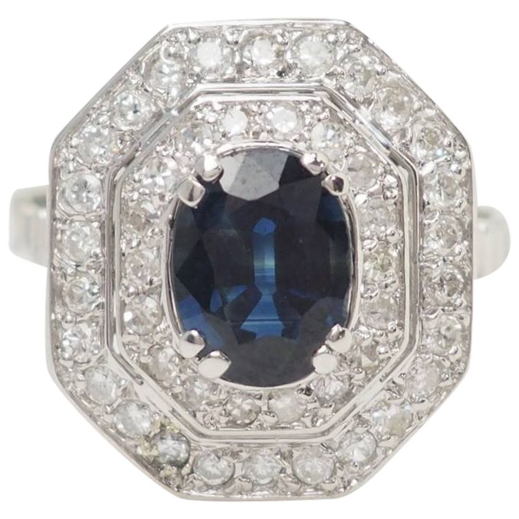 Bague double entourage en or blanc, saphir et diamants 