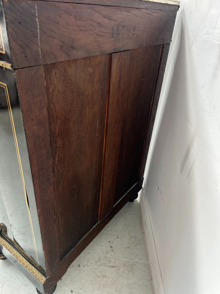 Armadio a un'anta di Napoleone III in legno nero e intarsio di ottone XIX secolo