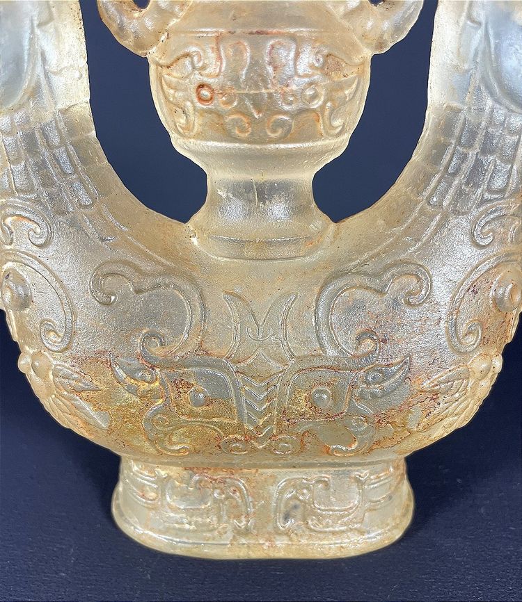 China, Qing Dynasty, early 19th century, candlestick in the form of a small vase surrounded by two rams.