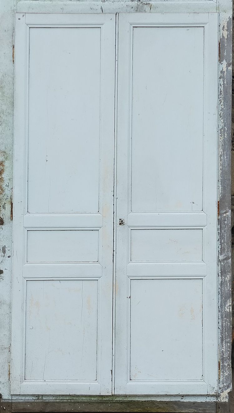 Two antique double cupboard doors with frames