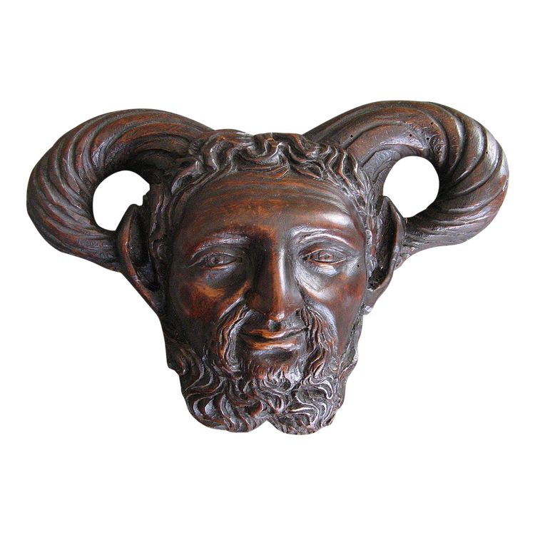Testa di fauno in legno intagliato del XVIII secolo.