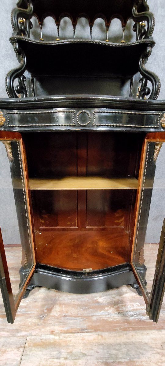 Napoleon III period "Boulle" curved display case in blackened wood and gilded wood circa 1850