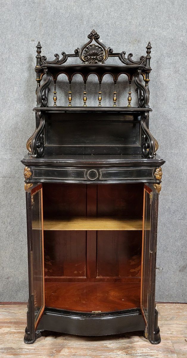 Napoleon III period "Boulle" curved display case in blackened wood and gilded wood circa 1850