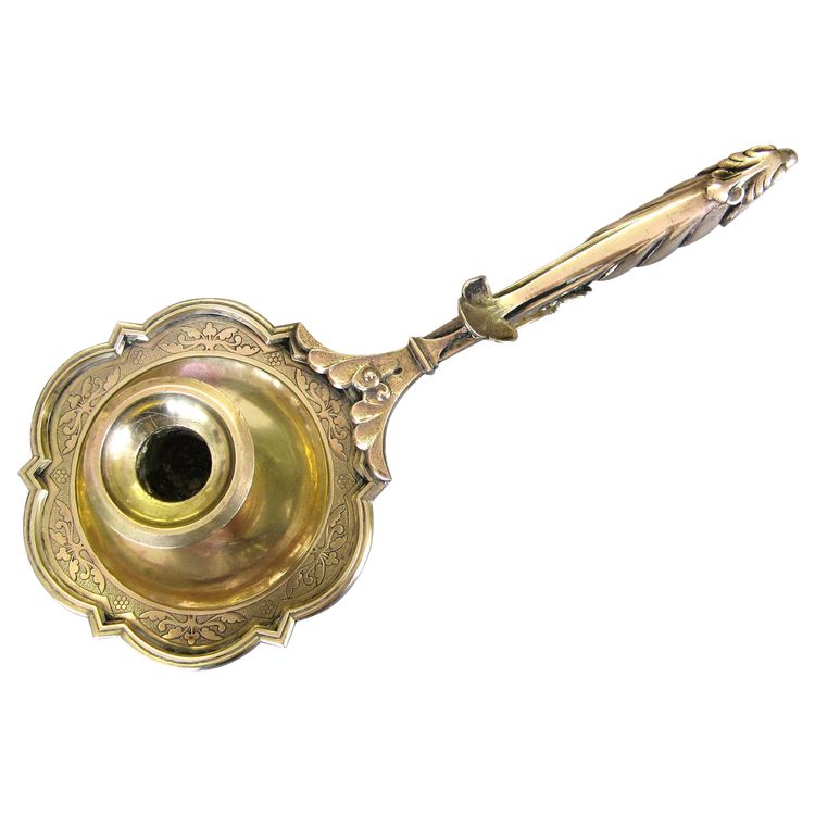 Bronze bishop candlestick with episcopal hand.