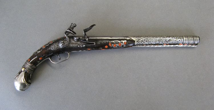 Pistola orientale a pietra focaia Impero Ottomano XIX secolo.