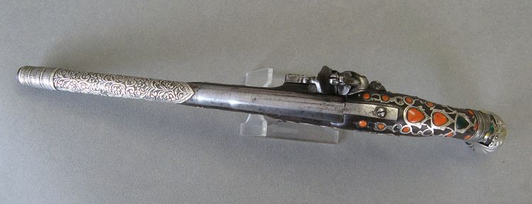 Pistola orientale a pietra focaia Impero Ottomano XIX secolo.