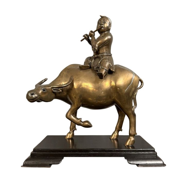 Asia XX secolo: scultura in bronzo con patina di rame e tracce di argentatura