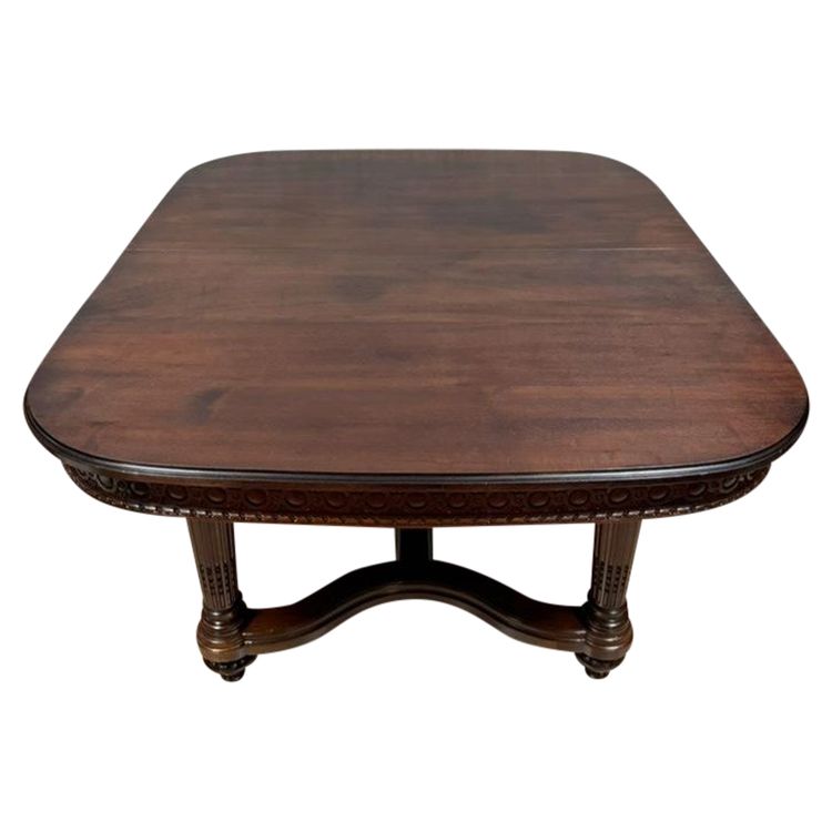 table a allonges style Louis XVI époque XIXème, en acajou