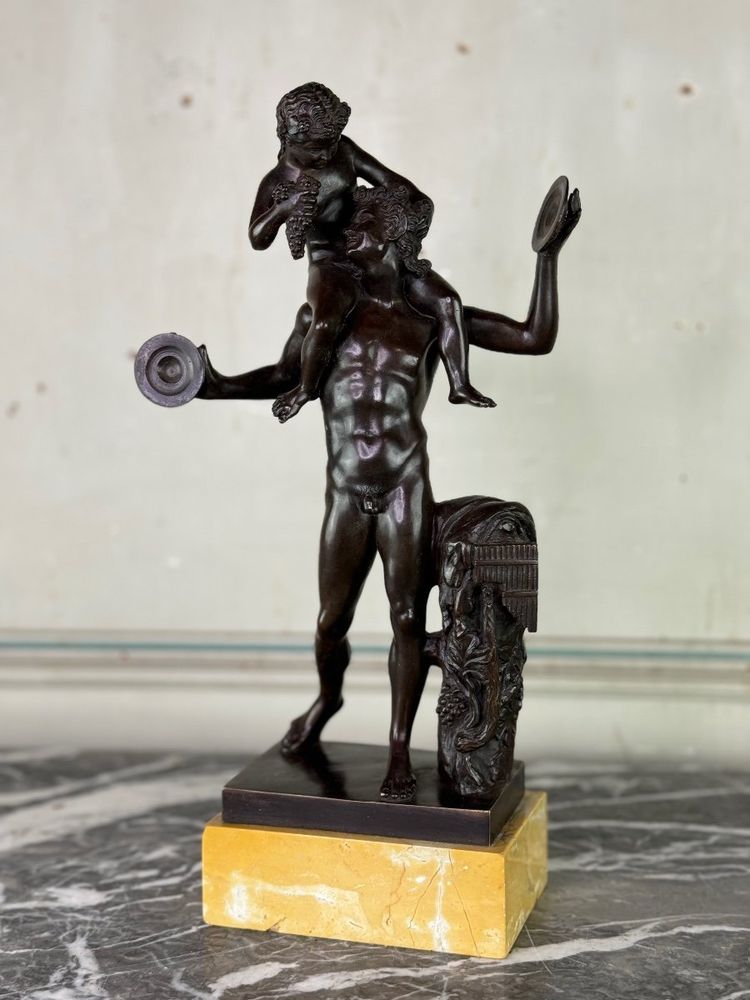 Dionysus on the Shoulders of a Satyr, Bronze after the Antique on a Sienna Yellow Base