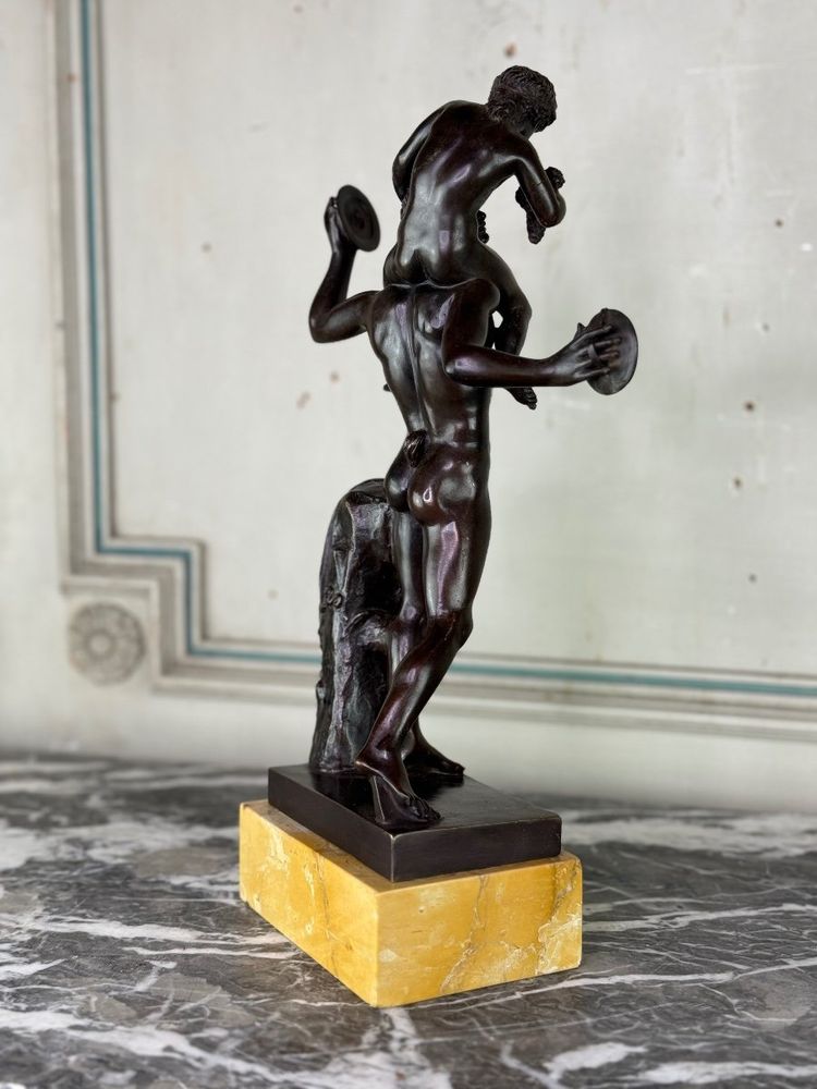 Dionysus on the Shoulders of a Satyr, Bronze after the Antique on a Sienna Yellow Base
