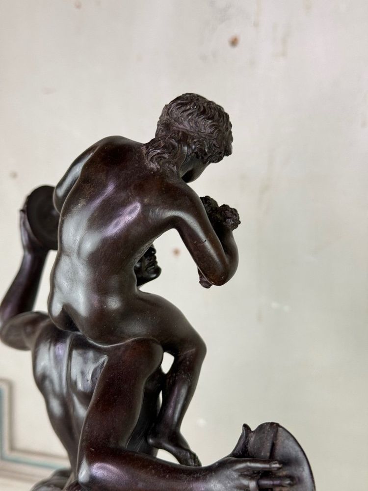 Dionysus on the Shoulders of a Satyr, Bronze after the Antique on a Sienna Yellow Base