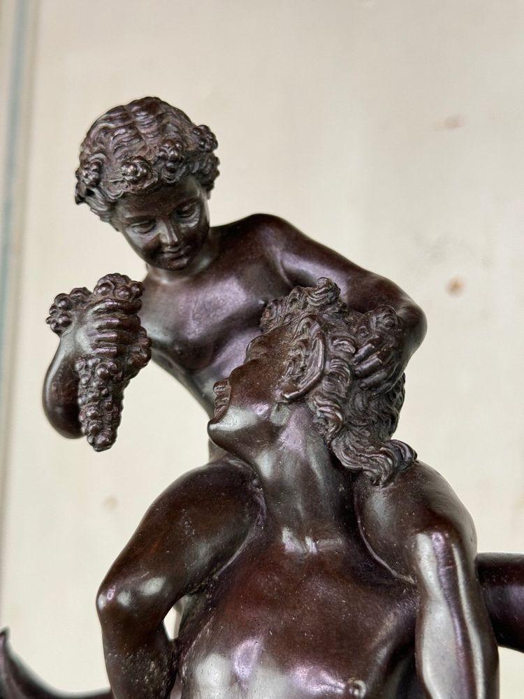 Dionysus on the Shoulders of a Satyr, Bronze after the Antique on a Sienna Yellow Base