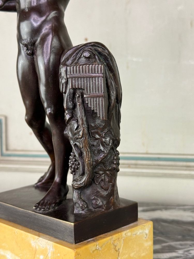 Dionysus on the Shoulders of a Satyr, Bronze after the Antique on a Sienna Yellow Base