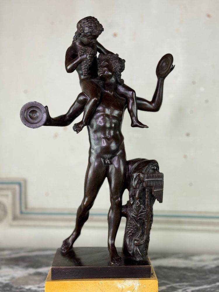 Dionysus on the Shoulders of a Satyr, Bronze after the Antique on a Sienna Yellow Base