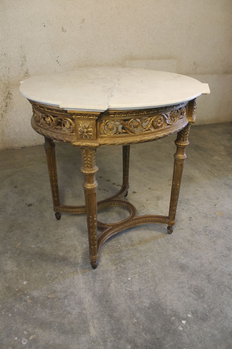 Table guéridon en bois sculpté doré de style Louis XVI époque 19ème