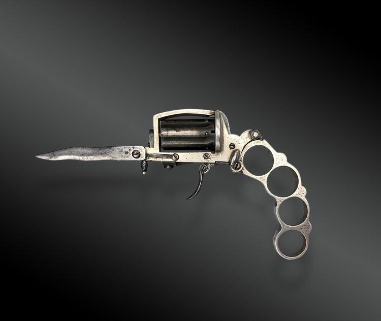 Revolver con sistema Dolne-Bar, noto come "APACHE", in argento massiccio. Circa 1870