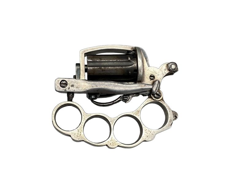 Revolver con sistema Dolne-Bar, noto come "APACHE", in argento massiccio. Circa 1870