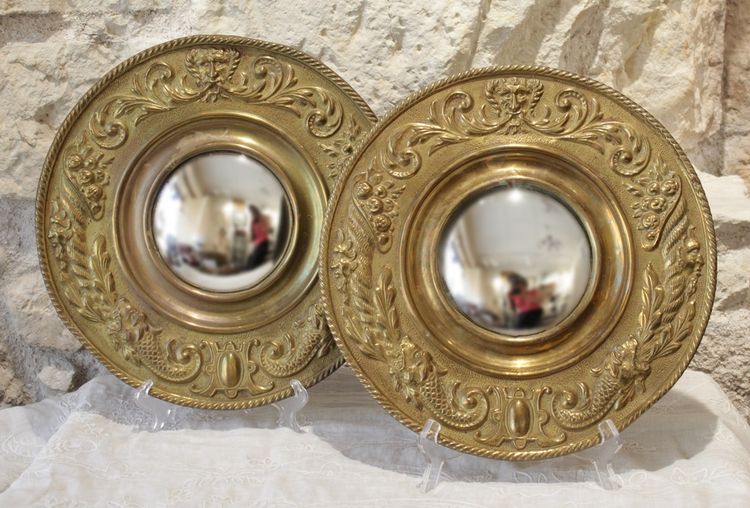 Pair of late 19th century embossed brass witch mirrors