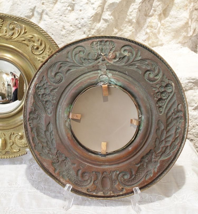 Pair of late 19th century embossed brass witch mirrors