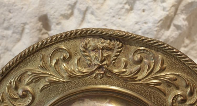 Pair of late 19th century embossed brass witch mirrors