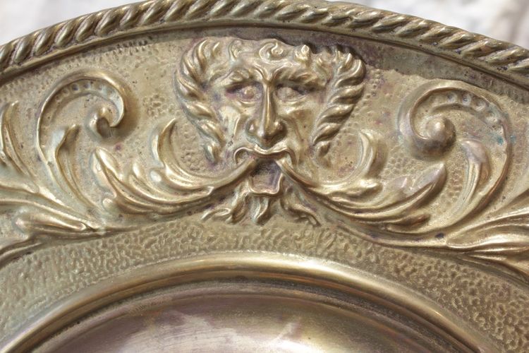 Pair of late 19th century embossed brass witch mirrors
