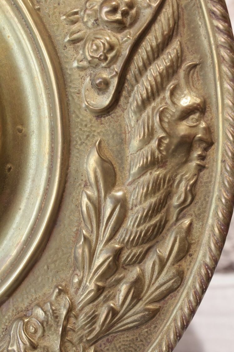 Pair of late 19th century embossed brass witch mirrors
