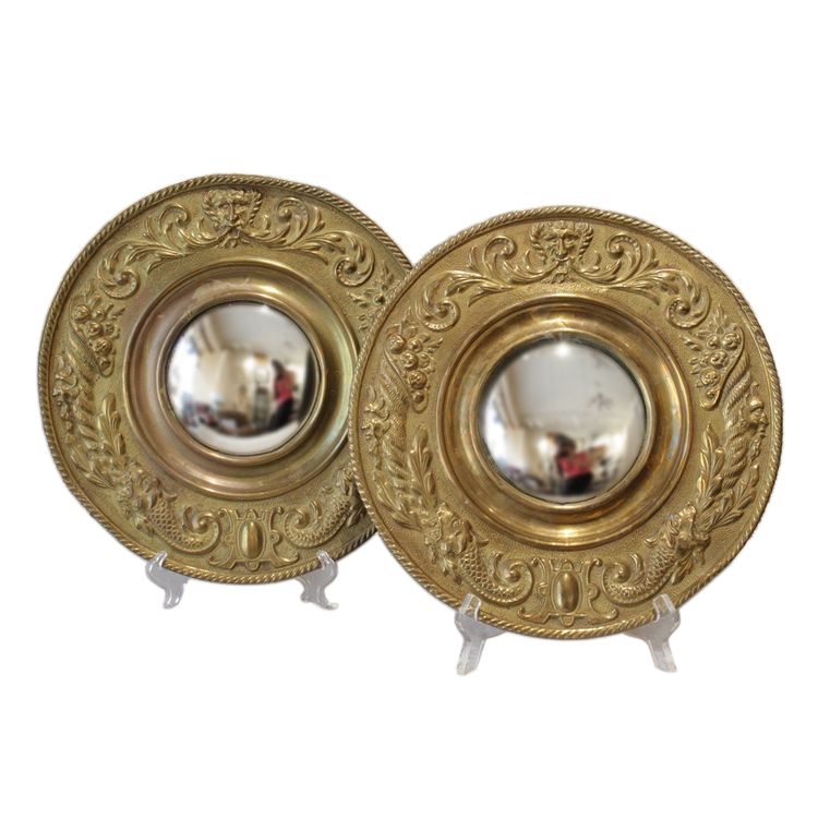 Pair of late 19th century embossed brass witch mirrors