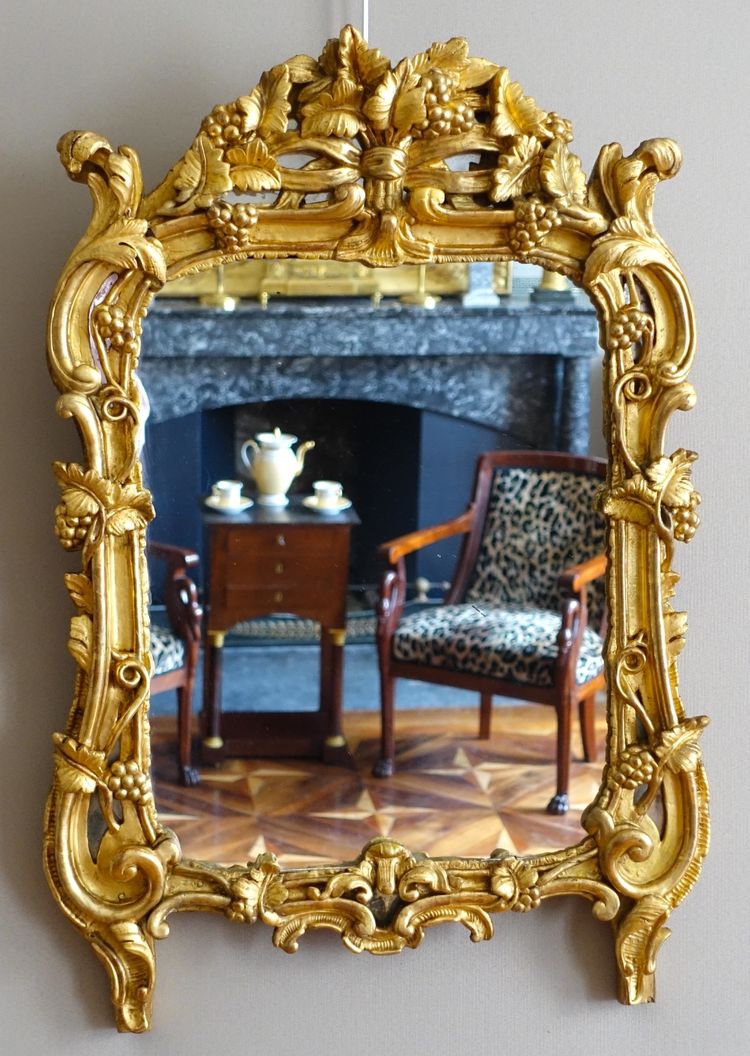 Miroir en bois doré, glace au mercure, travail Provencal d'époque Louis XV - Transition