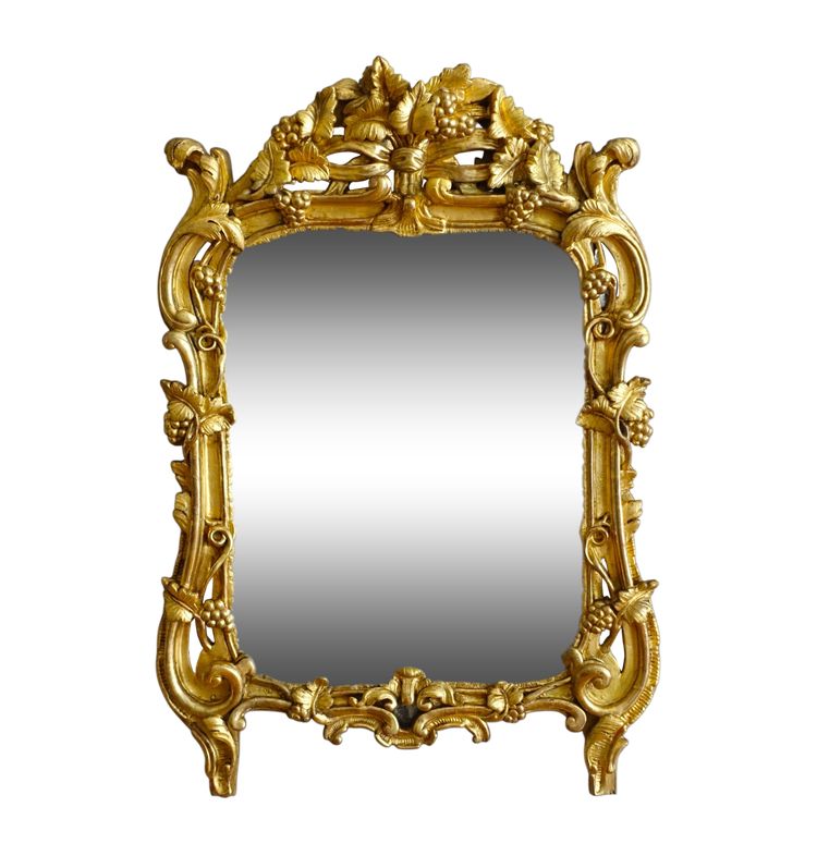 Miroir en bois doré, glace au mercure, travail Provencal d'époque Louis XV - Transition