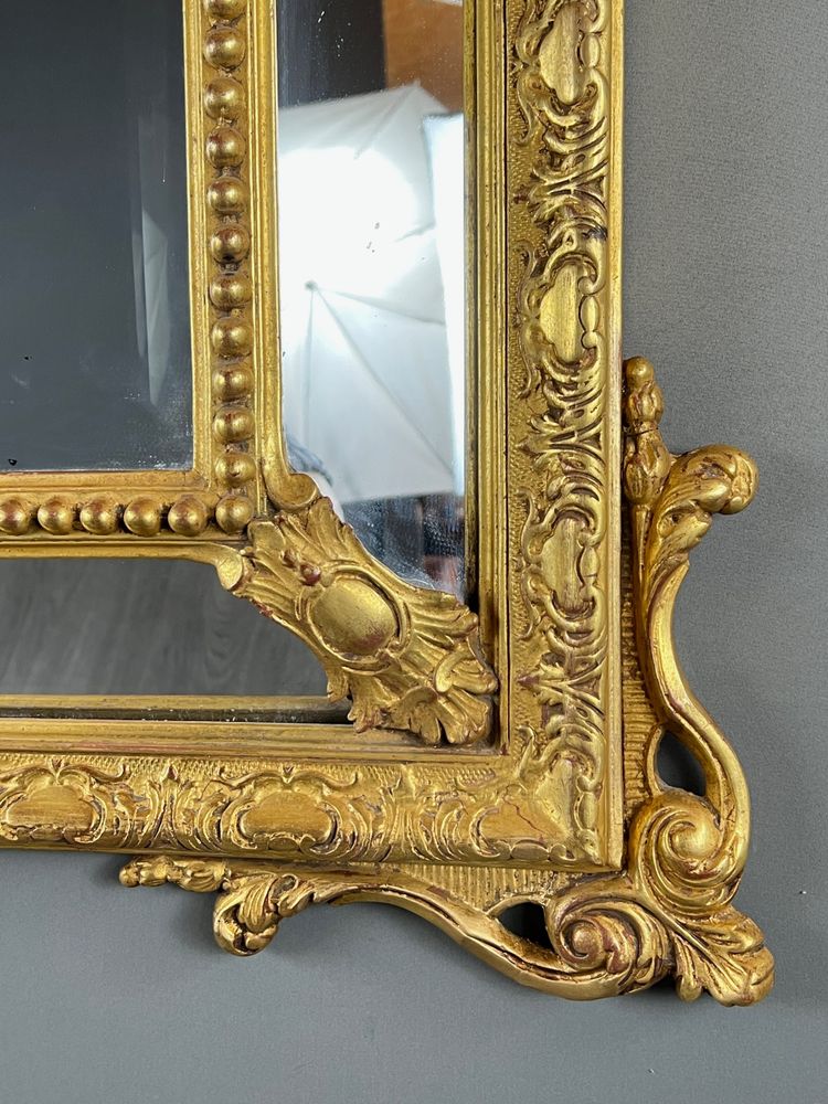Grand miroir à fronton en bois doré, XIXe siècle