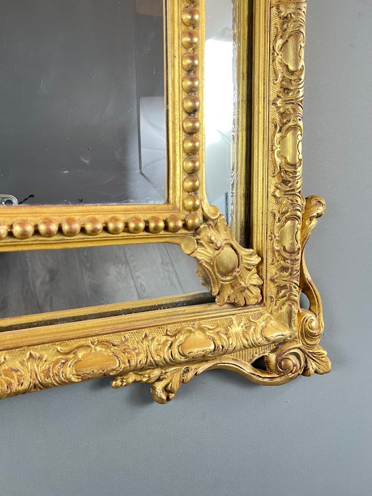 Grand miroir à fronton en bois doré, XIXe siècle