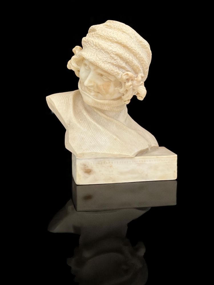 ALABASTER SCULPTURE FROM THE 1930S REPRESENTING A PORTRAIT OF A WOMAN WITH A HAT