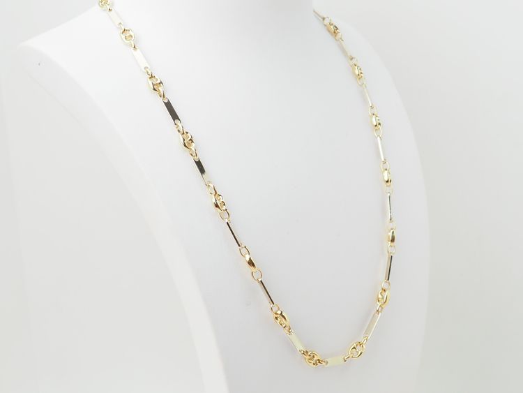 Collana con chicchi di caffè in oro giallo e bianco