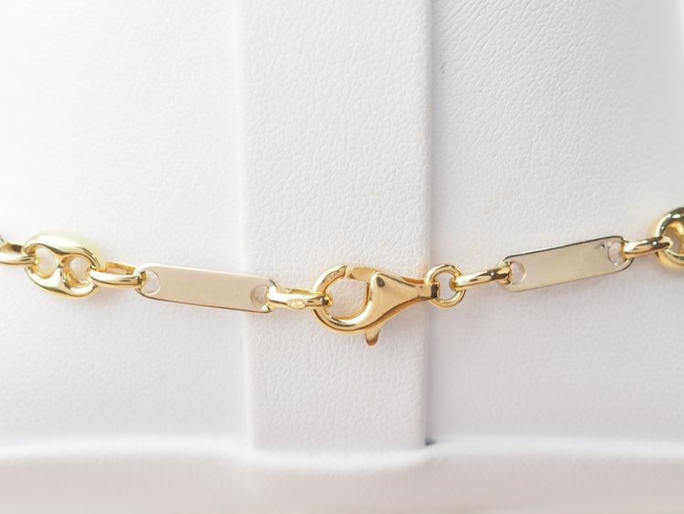 Collana con chicchi di caffè in oro giallo e bianco
