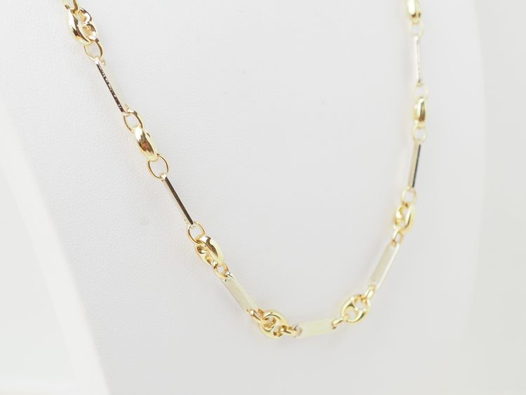 Collana con chicchi di caffè in oro giallo e bianco