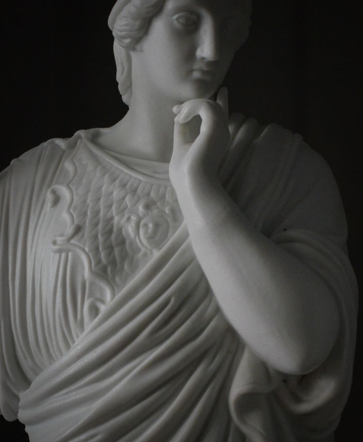 Pair of neoclassical biscuit statuettes